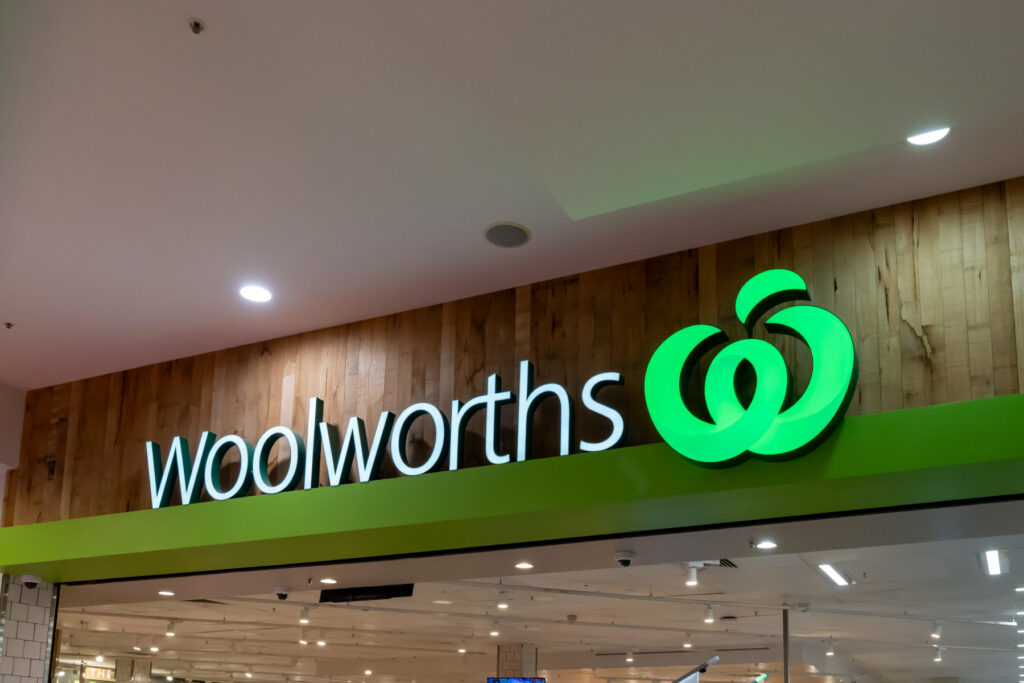 Sydney, NSW, Australia - September 8, 2025: Close up of a Woolworths supermarket store sign is seen. Sydney, NSW, Australia. Woolworths Supermarkets is an Australian chain of supermarkets.