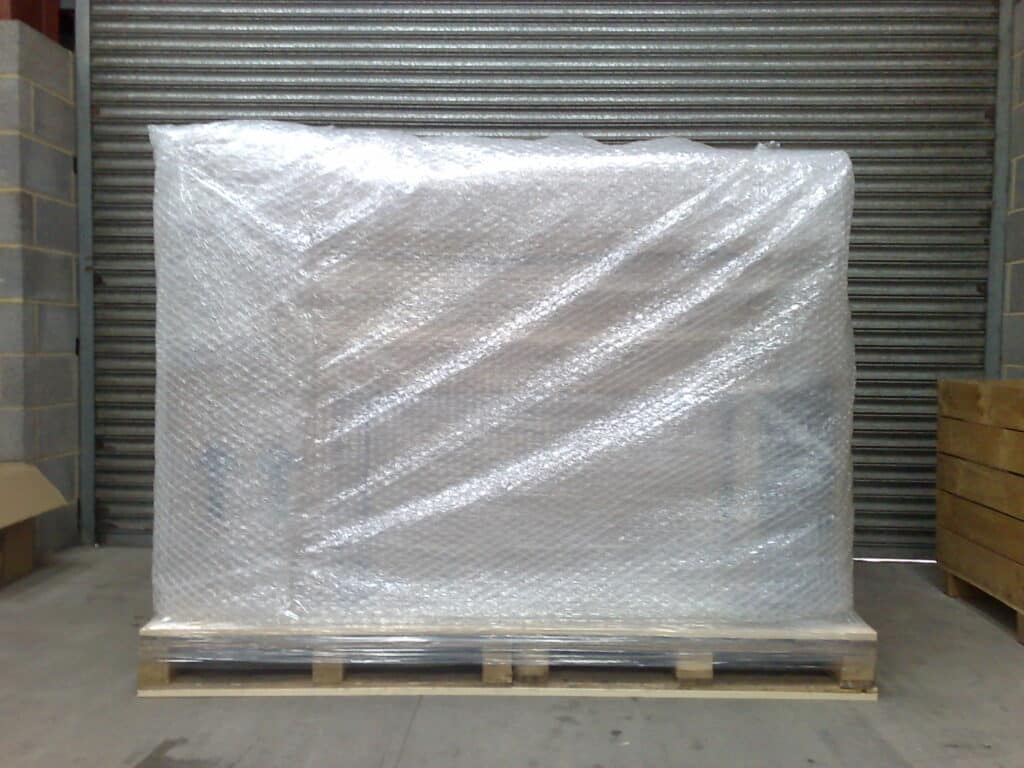 Bubble-wrapped pallet of personal effects ready for the next stage of packing for international removals