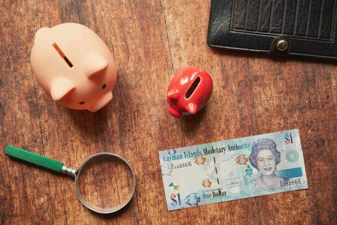 how much does it cost to move to the caymen islands from uk