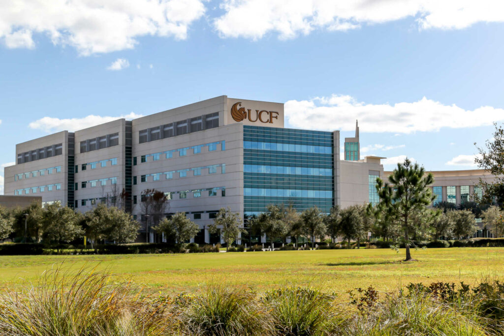 Exterior view of a University of Central Florida (UCF) campus building in Orlando, representing the city’s higher education opportunities.