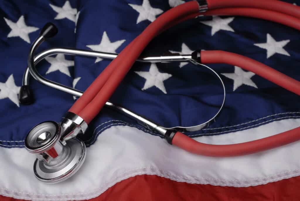 Image of a Stethoscope on the American Flag - US Healthcare - Healthcare in San Diego - Moving to San Diego