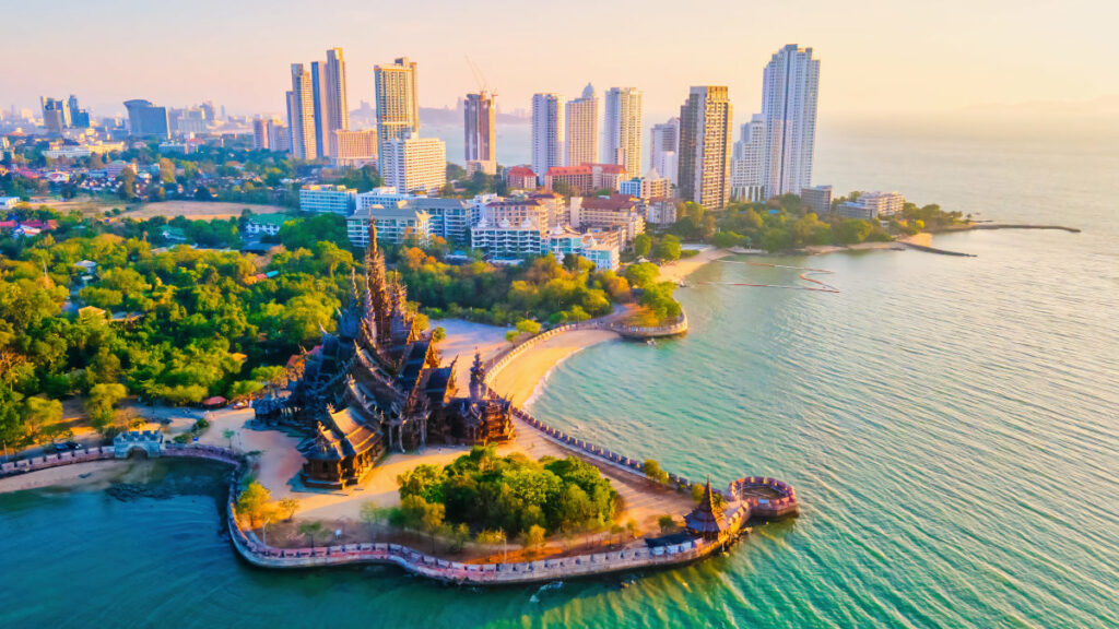 Sanctuary of Truth, Pattaya skyline Thailand at sunset